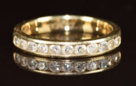 A 14k gold half eternity ring set with diamonds, the total diamond weight approximately 0.52ct, 2.