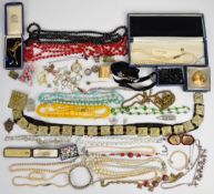 A collection of costume jewellery including beads, Art Deco clips, vintage ring box, Victorian