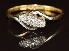 An 18ct gold ring set with diamonds in a platinum setting, 2.3g, size P