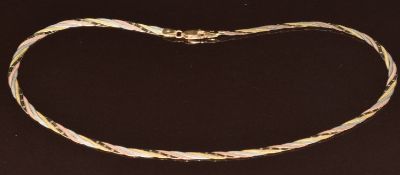 A 9ct gold tri-coloured ribbon necklace, 7.2g, 40cm