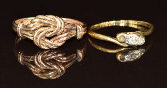 An 18ct gold ring set with diamonds (1.4g, size M, one diamond missing) and a 9ct gold knot ring (