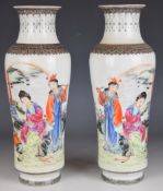 Pair of 20thC Chinese vases with figural decoration, script verso, marks and paper label to base,