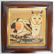 19thC wool work / needlework of a recumbent tabby cat, 39 x 38cm, in mahogany cushion frame, 59 x