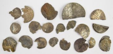 An accumulation of hammered silver coinage, all with some damage, to include sovereign type '