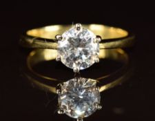 An 18ct gold ring set with a modern round brilliant cut diamond of approximately 0.98ct, 2.8g,