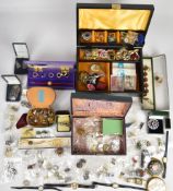 A collection of costume jewellery including vintage brooches, rings and earrings, silver earrings,
