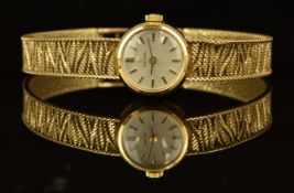 Omega 9ct gold ladies wristwatch ref. 711.5667 with two-tone hands and baton hour markers, silver