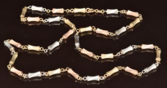 A 9ct gold tri-coloured necklace made up of textured links, 15.3g, 62cm