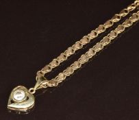 A 9ct gold necklace with 9ct gold heart pendant set with cubic zirconia, 13.3g, 52cm