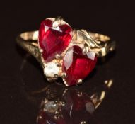 A 10k gold ring set with synthetic rubies, 2.7g, size N