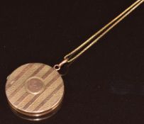 A c1920 9ct gold locket (2.3cm) on 9ct gold chain, 4.2g
