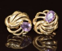 A pair of 9ct gold earrings each set with an amethyst, 2.2g