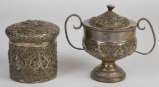 Burmese or similar silver lidded pot decorated with deities, height 10cm, weight 204g together