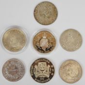 Seven crown sized and similar silver coins comprising two Ottoman examples, George VI South Africa