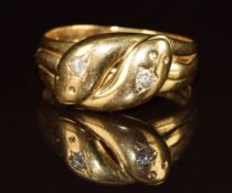 Edwardian 18ct gold ring in the form of two serpents set with two old cut diamonds, Birmingham 1907,