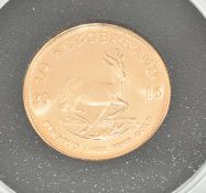 2016 South Africa gold ¼ ounce Krugerrand, uncirculated, with Harrington & Bryne certificate
