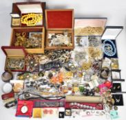 A collection of jewellery including earrings, rose quartz necklace, pewter bangle and pendant,