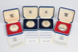 Four Royal Mint cased proof silver crowns comprising two each of 1977 Silver Jubilee and 1981