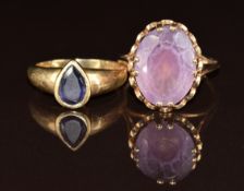 Two 9ct gold rings, one set with an oval cut amethyst, and the other iolite, 8.8g, sizes N & R