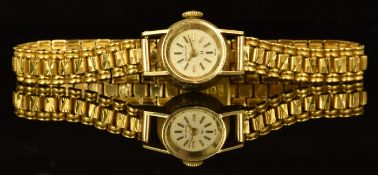 Hamilton 18ct gold ladies wristwatch with gold hands and baton hour markers, white dial, textured