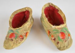 Pair of 19thC embroidered children's slippers, probably Georgian, length 12.5cm