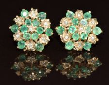 A pair of 9ct gold earrings set with emeralds and diamonds in a cluster, 1.9g