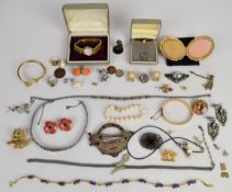 A collection of jewellery including silver ring, pearl bracelet, Raymond Weil watch, Nina Ricci