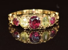 Victorian 18ct gold ring set with garnet, peridot and tourmaline, 1.7g, size K