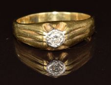 An 18ct gold ring set with a diamond of approximately 0.08ct, 5.3g, size R