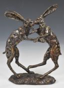 A pair of Frith Sculpture boxing hares, H26cm