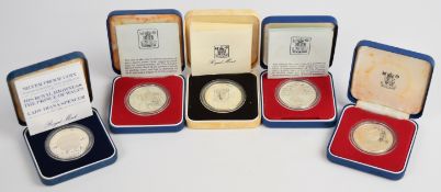 Five Royal Mint cased proof commemorative silver crowns and similar, comprising 1981 Royal