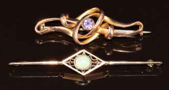 Two c1910 9ct gold brooches, one set with an opal and the other an amethyst, 5g