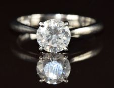 A platinum ring set with a round brilliant cut diamond of approximately 2ct, 7g, size T