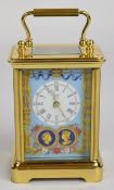 Halcyon Days enamelled brass cased bevelled glass carriage clock, H16cm