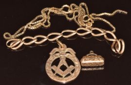 A 9ct gold Masonic fob/pendent, 9ct gold chain, section of 9ct gold fob chain and handbag charm, 14g