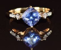 An 18k gold ring set with a tanzanite of approximately 1.8ct and diamonds, 3.7g, size Q