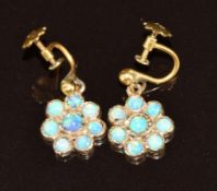 A pair of 9ct gold earrings each set with opals in a cluster, 2.7g