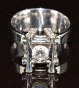 An 18ct white gold ring designed by Marco Oldani for John Rasmussen and set with diamonds, the
