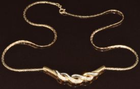 A 9ct gold necklace set with diamonds, 8.2g, 42cm