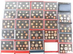 Twenty three UK coin sets comprising 1984, 3 x 1985, 2 x 1986, 2 x 1987, 2 x 1988, 1989, 2 x 1990,