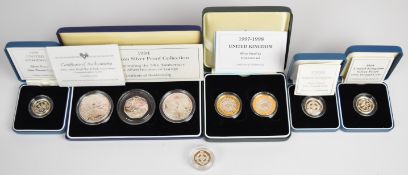 Nine Royal Mint limited edition proof silver coins comprising 1994 three coin set, 1997 and 1998 £