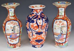 Three Japanese vases including one decorated in Chinese style with enamelled figural decoration,