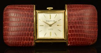 Mappin purse watch with gold hands and hour markers, silver dial, red leather case, pop-out stand