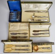 Cased French cutlery comprising white metal handled sifter ladle, two similar pairs of serving