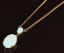 A 9ct gold necklace set with two opals, 5g, 42cm