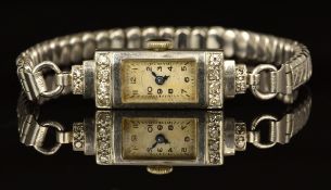 Art Deco platinum ladies wristwatch with diamonds set to the case, blued hands, Arabic numerals,