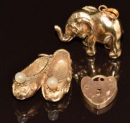 Two 9ct gold charms, one in the form of an elephant and the other a pair of shoes, together with a