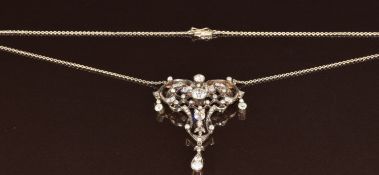 A c1900 necklace set with old cut diamonds in a foliate and lattice setting, the centre diamond