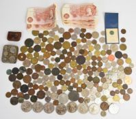 A collection of sundry coinage including overseas, some ten shilling banknotes, modern crowns,