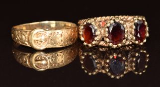 A 9ct gold ring set with three garnets and a 9ct gold buckle ring, 6g, size K & P
